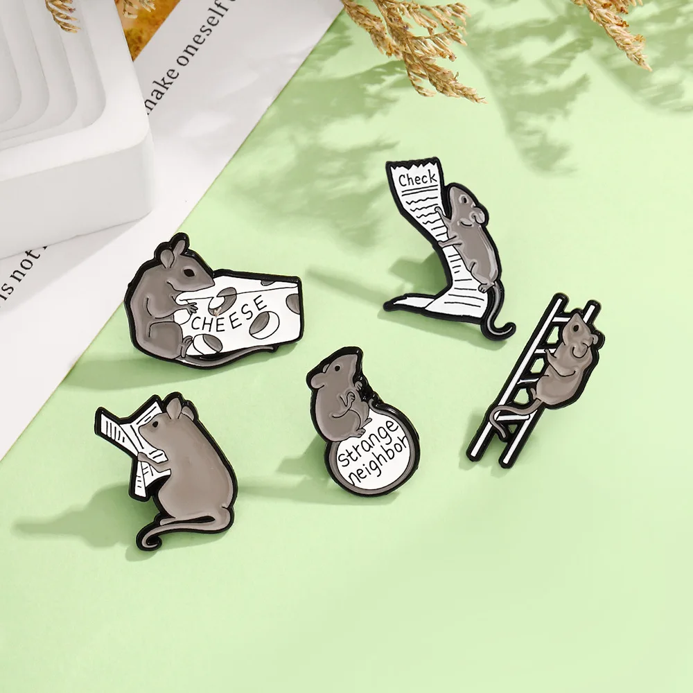 Smart and mischievous little mouse reading newspaper, climbing ladder to find food, cartoon cute animal brooch