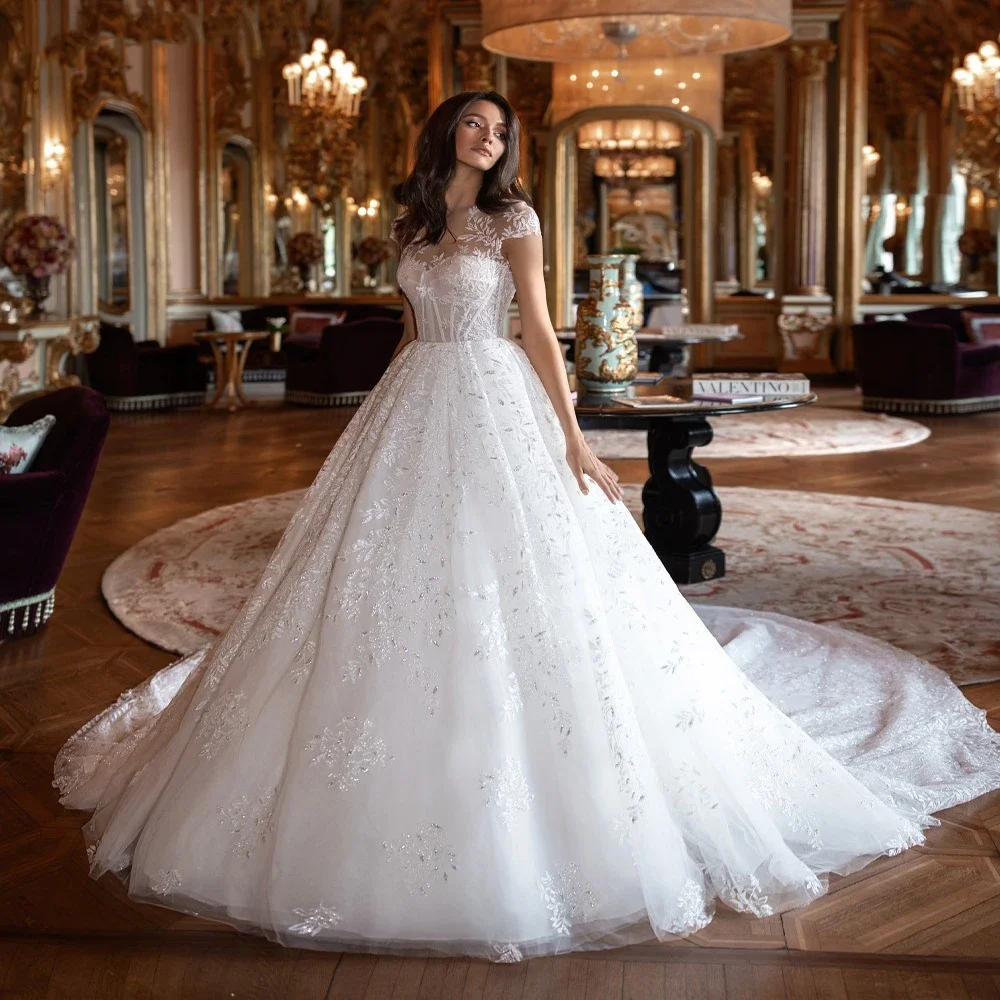 

Flavinke Customized Elegant Scoop Neckline Sparkle Leaf Lace Puffy A Line Wedding Dresses Chapel Train Vestido De Noiva 2025