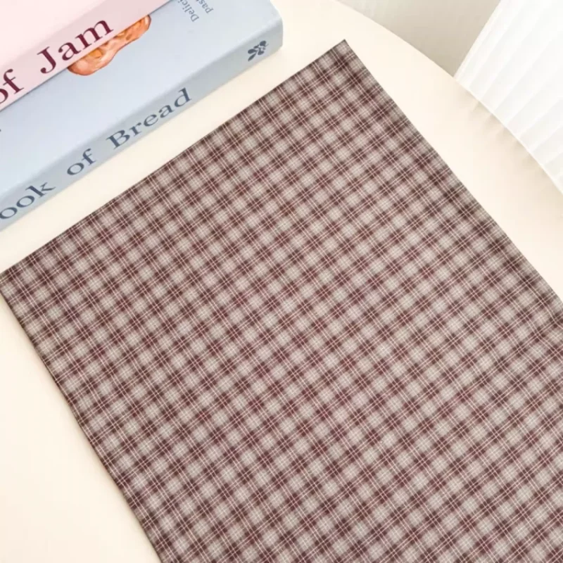 

Gray coffee checkered fabric, used for making hair rings, clothing jackets, tablecloths, and other fabrics.