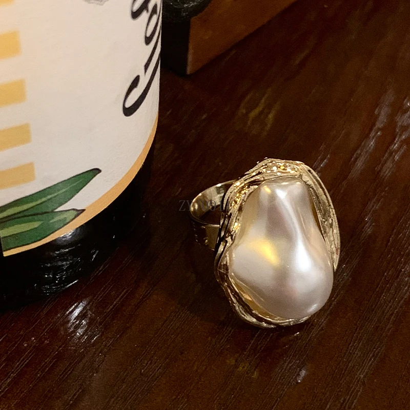 ヨーロッパとアメリカの宮廷スタイルの不規則なパールリング個性誇張されたオープン人差し指リングレトロリング