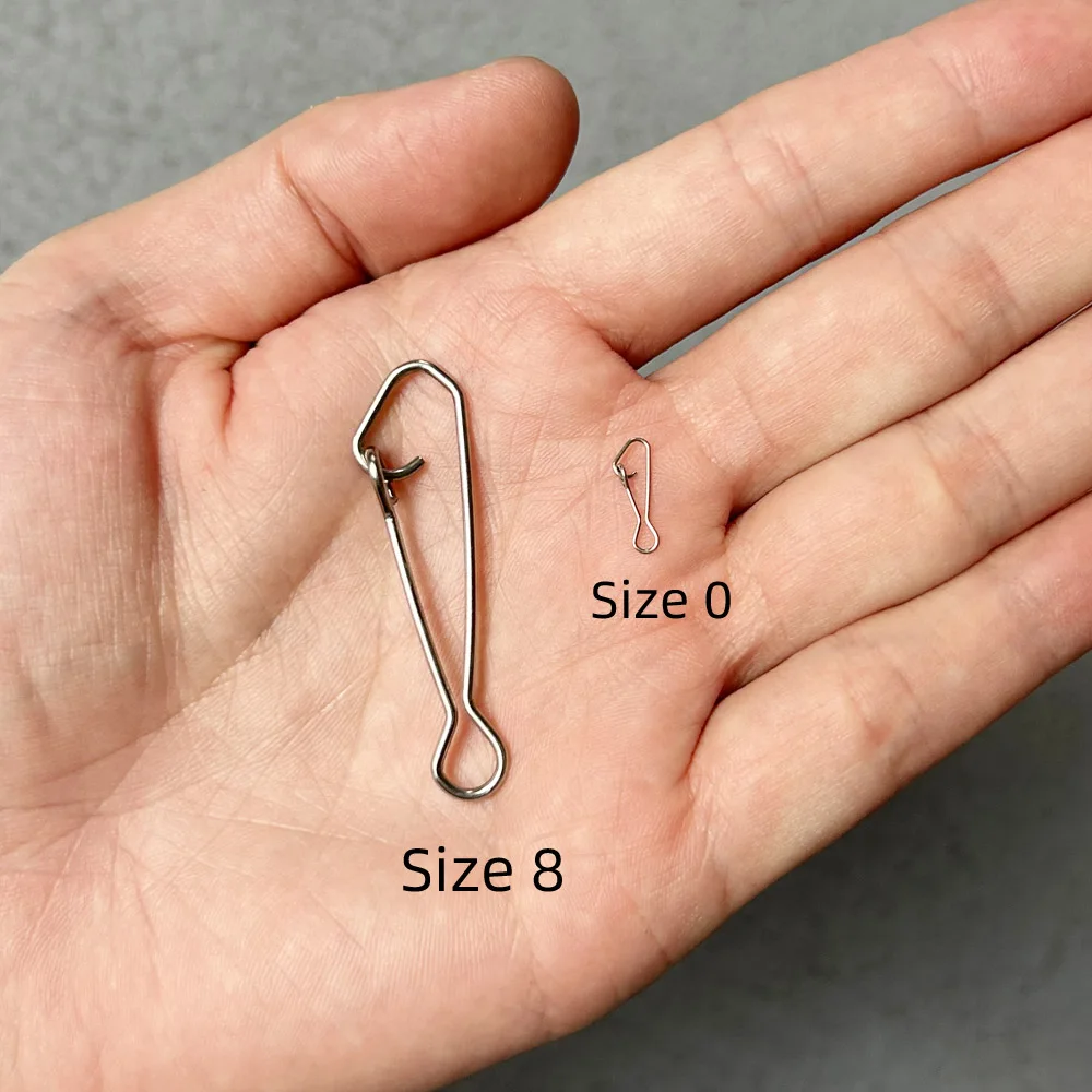DNDYUJU 100pcs Rolling Swivels Rings Snap Interlock Pin Fishing Connector For Fishhook Line Lure Fishing Accessories