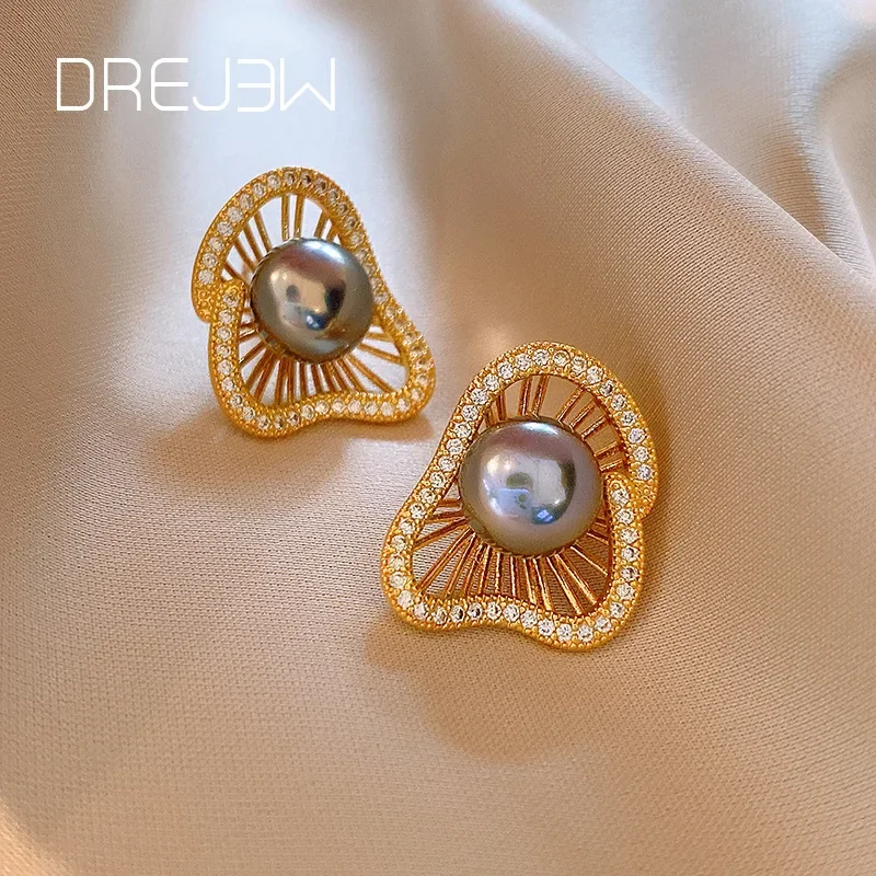 DREJEW Hollow Out Irregular Pearl Earrings for Women Retro 2025 Korean Fashion Studs Temperament Girls Luxury Designer Jewelry