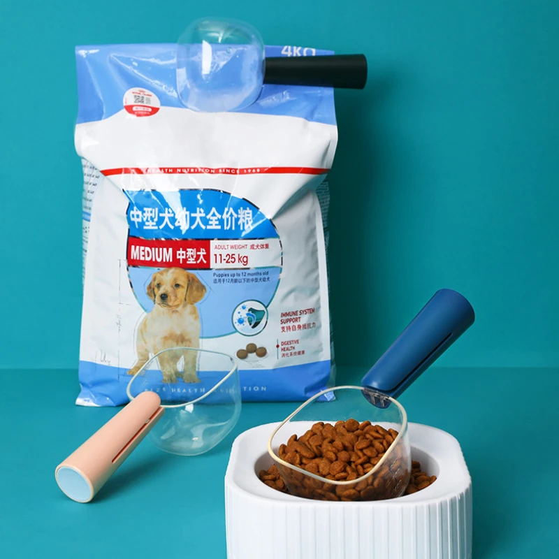 مستلزمات ملعقة شفافة جديدة لأغذية الحيوانات الأليفة مع قياس متدرج لتغذية القطط والكلاب وملعقة مجرفة منتجات الحيوانات الأليفة