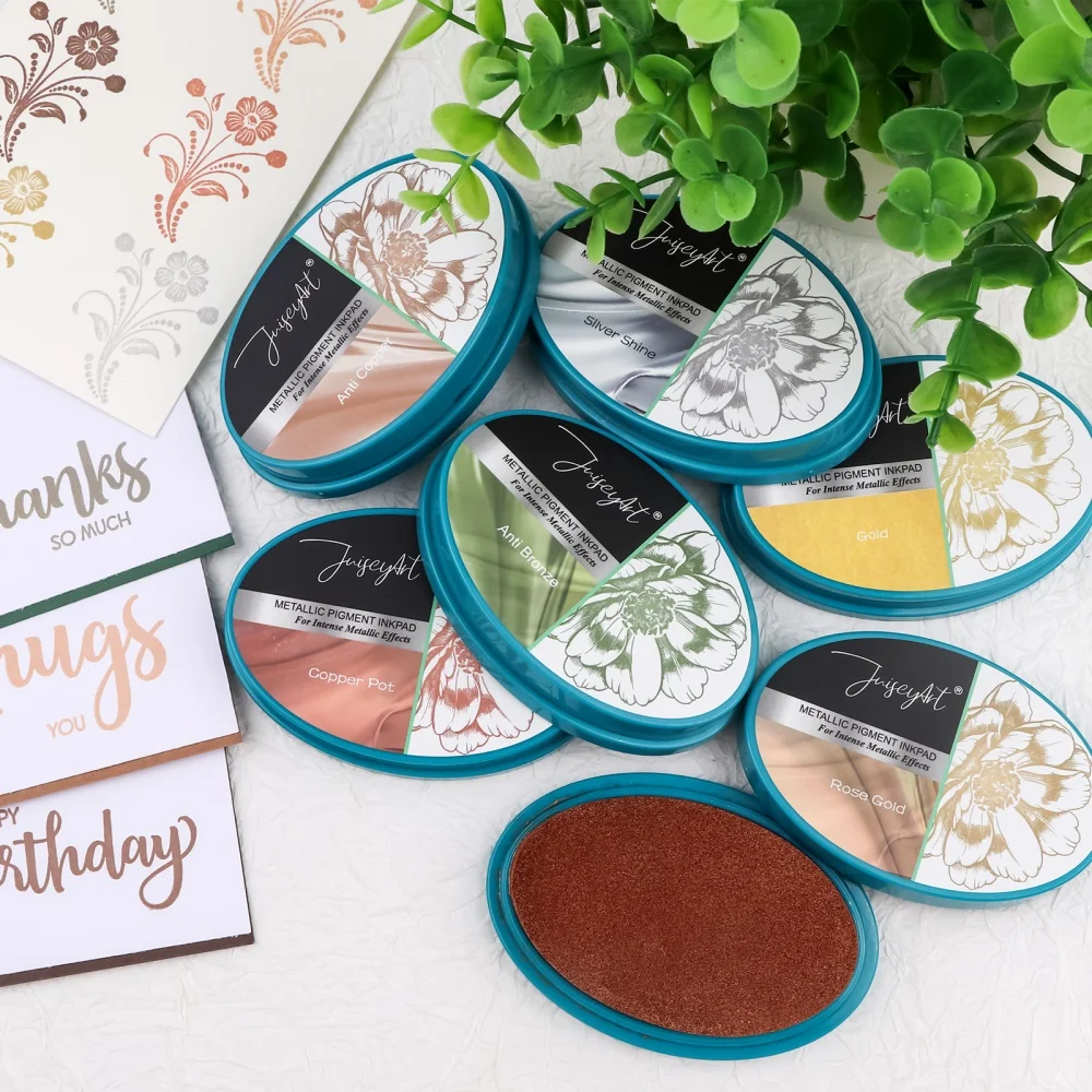 Mehrfarbige Metallic-Pigment-Stempelkissen-Präge-Tintenpads für DIY-Bastelprojekte verleihen einen Hauch von hellem Goldschimmer und Glanz.