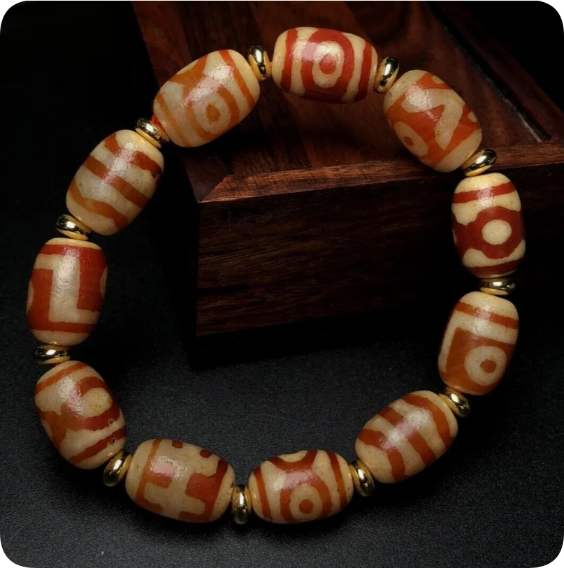 Tibetan Red Meat Noble Three Eyes Tiger Teeth dzi beads 11 * 16mm