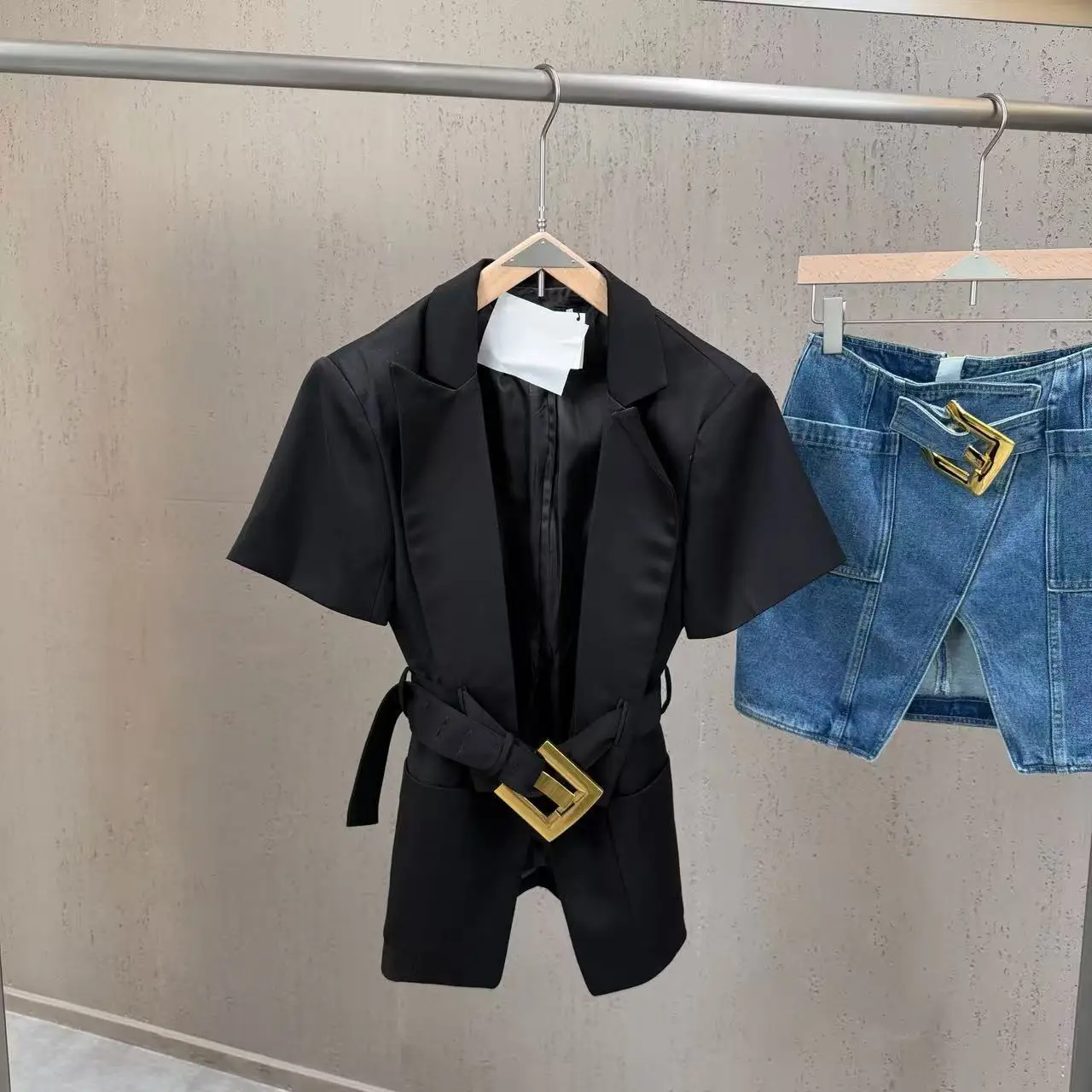 

Black Short Sleeve Blazer with Gold Square Buckle Belt & Blue High Waist Asymmetric Denim Skirt Set Edgy Chic Two-Piece Outfit