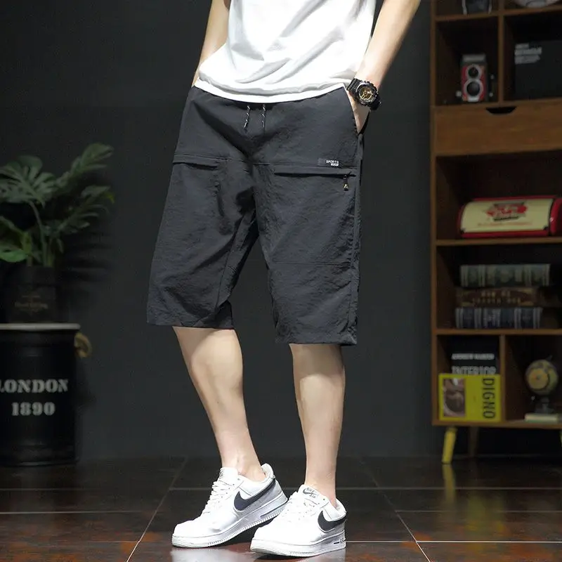 Summer New Fashion Casual Versatile Loose Beach Shorts Men Elastic Waist Drawstring Pockets Big Size Sports Straight Short Pants