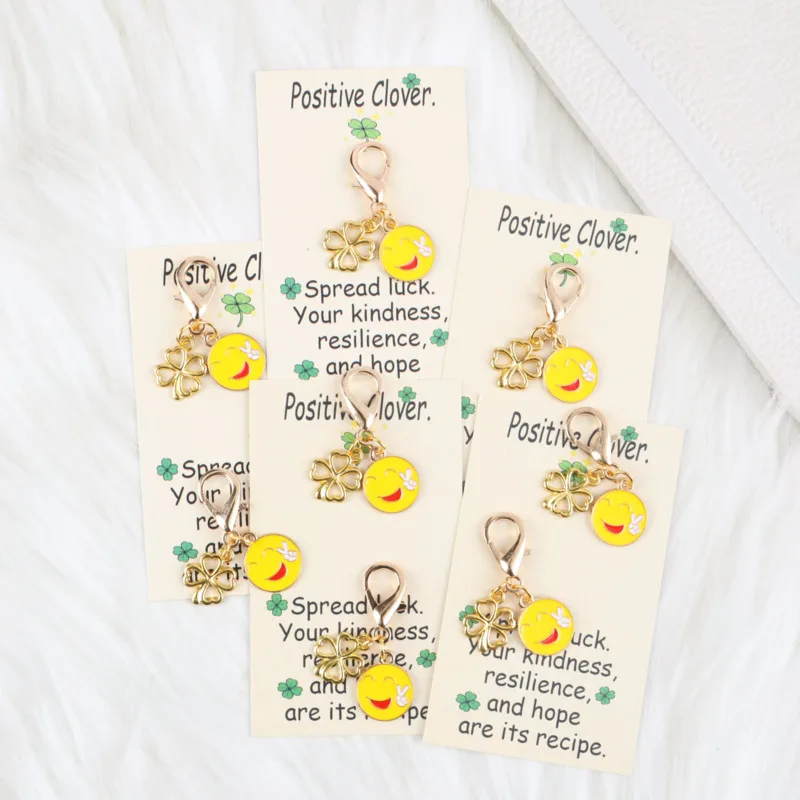 4/8pcs Cute smiling face paired with a four-leaf clover keychain set Card with a positive four-leaf clover  Actively support gif