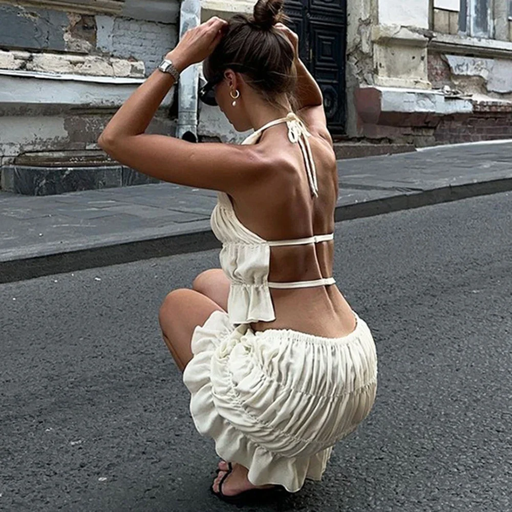 ชุดเซ็ตกระโปรงสั้นรัดรูป DINADD สำหรับผู้หญิง เสื้อเปิดหลังทรง Halter กระโปรงพลีทเอวสูง ชุดเซ็ตกระโปรงสั้นแฟชั่นผู้หญิง ดีไซน์หรูหรา