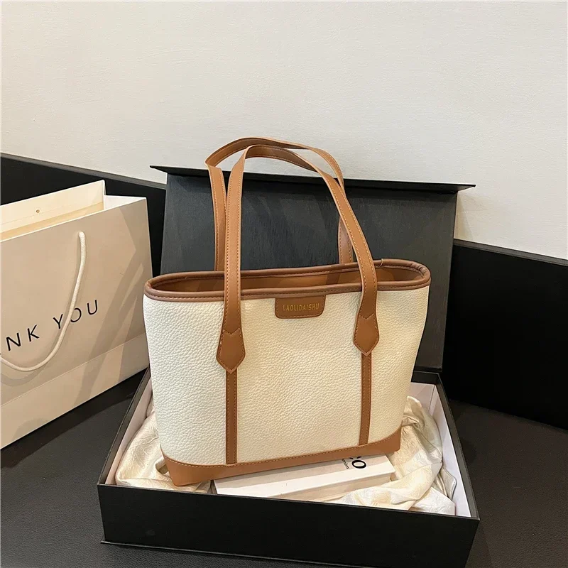 

1, модная брендовая сумка, новая сумка на плечо большой вместимости, высококачественная женская сумка, модная нишевая сумка для отдыха, женская большая сумка