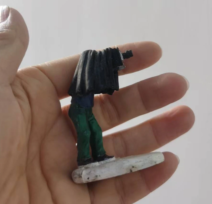 Resin figure mental psychological sand table game box court therapy man taking photo