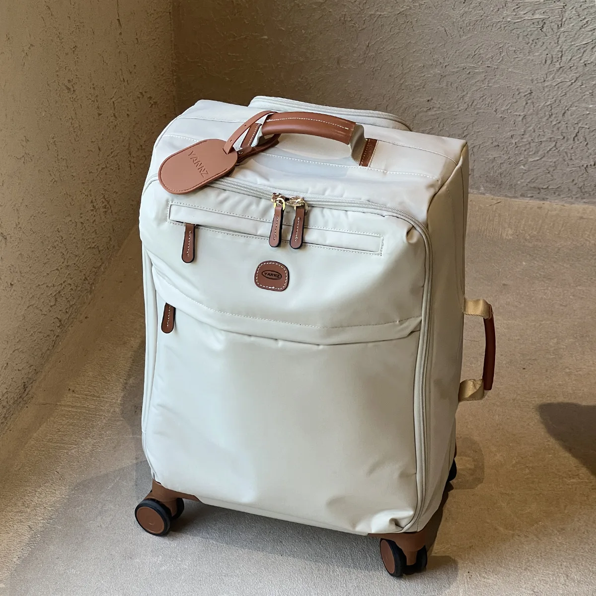 High-quality ultra-light waterproof trolley case with 360-degree swivel wheels, splash-proof fabric, and large capacity
