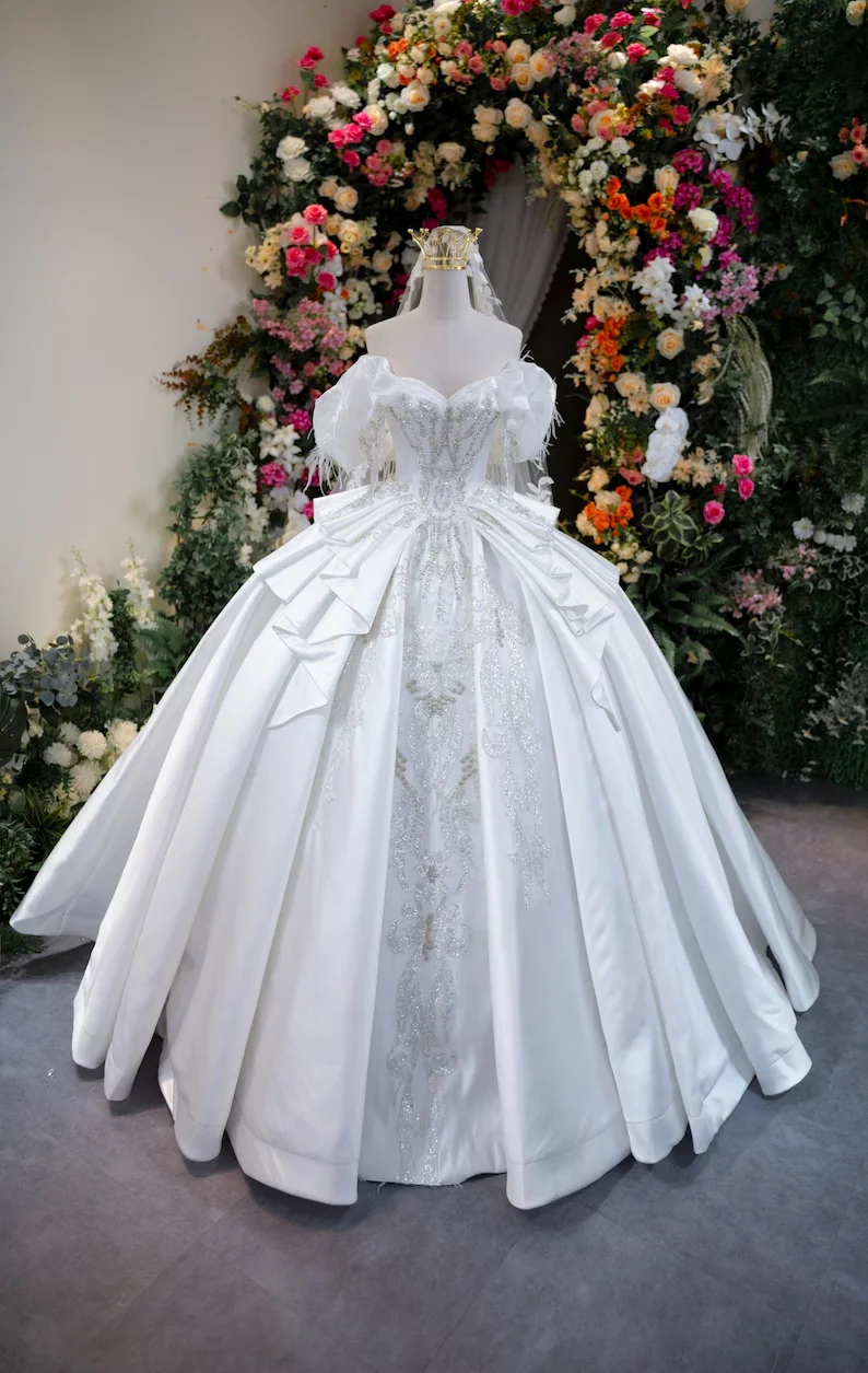 

Elegant Feather Off Shoulder Satin Wedding Dress 2025 Sparkly Beaded Lace Ball Gown Bridal Dress with Cathedral Train Customized
