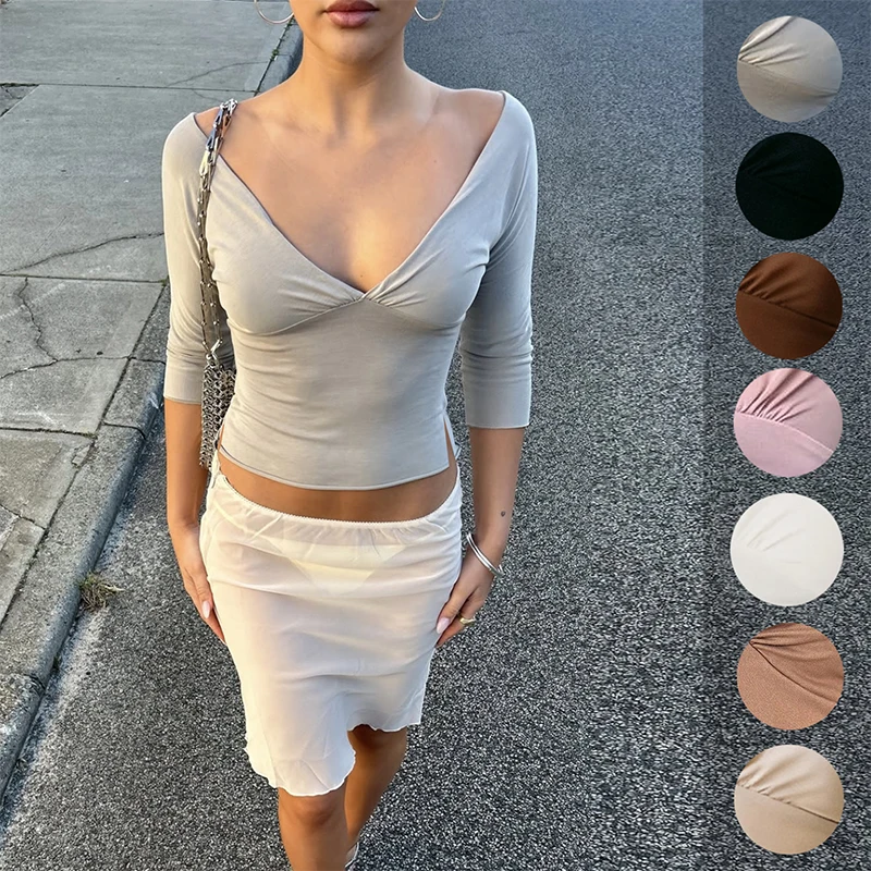 

Женская футболка OMSJ 2026 Весна-Лето: Простая, сексуальная, эластичная, с глубоким V-образным вырезом, боковым разрезом, рукавом до локтя, однотонная, классическая, базовая, элегантная.