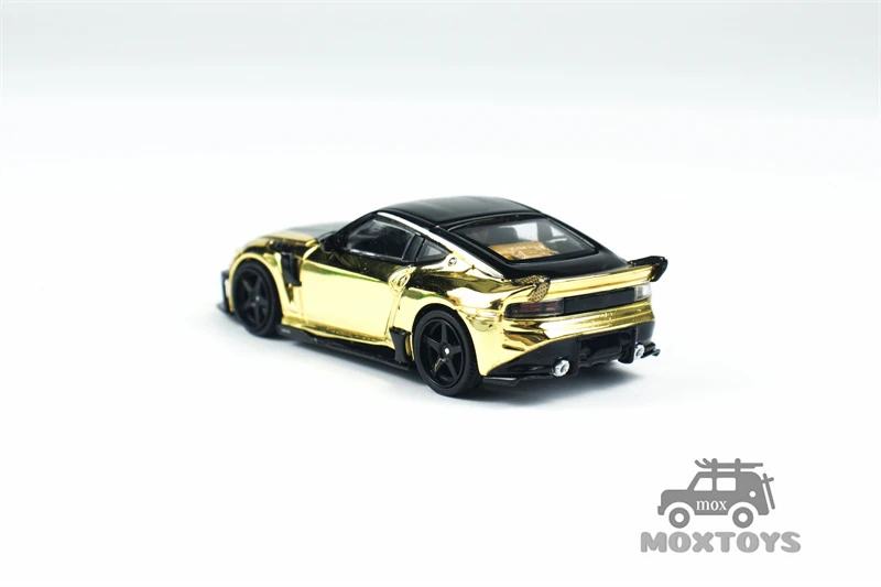 سيارة MINI GT 1:64 VeilSide FFZ400 كروم ذهبي 985 دييكاست #4