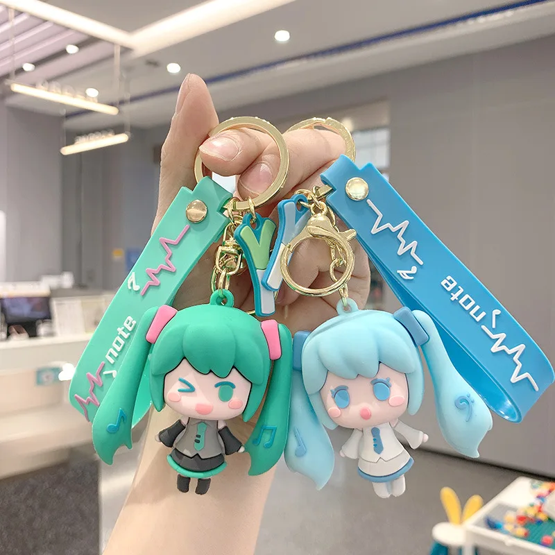 Image of 1/4 Stück Hatsune Miku Schlüsselanhänger Niedliches Anime-Mädchen Kreatives Zubehör Süßer Rucksack-Anhänger Deko Mode Überraschung Paar-Spielzeug Geschenk
