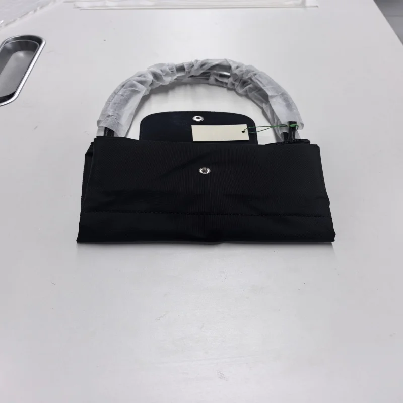Opvouwbare klassieke nylon handtas, dameshandtas met borduurwerk.