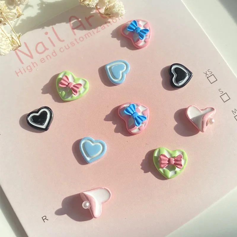 TSZS 10 ชิ้น/ล็อตที่มีสีสัน Kawaii Heart Bow Nail Art Charm เกาหลีญี่ปุ่น 3D น่ารักรักริบบิ้นเล็บตกแต่ง