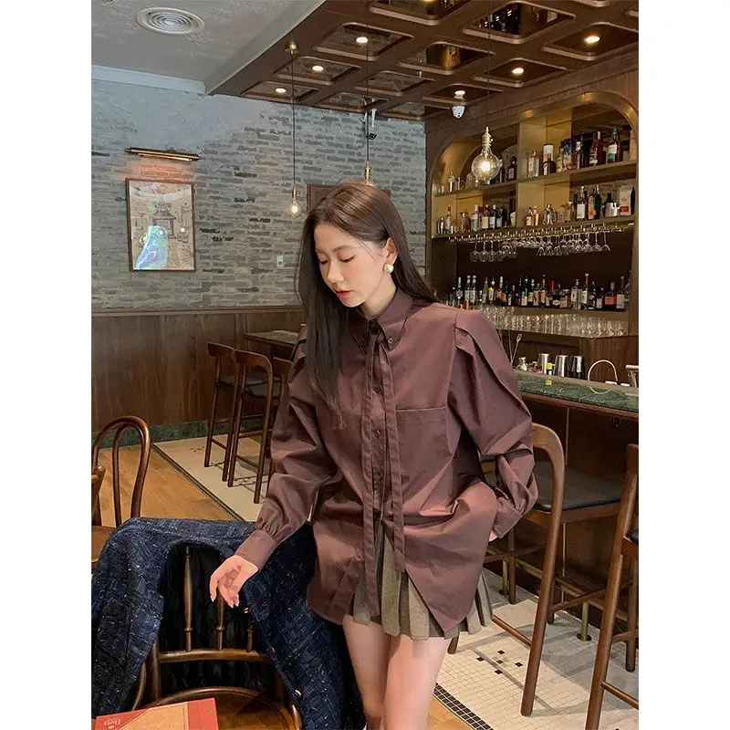 

Весенняя новая рубашка с длинными рукавами во французском стиле ретро, свободный нишевый топ с коричневыми ремешками