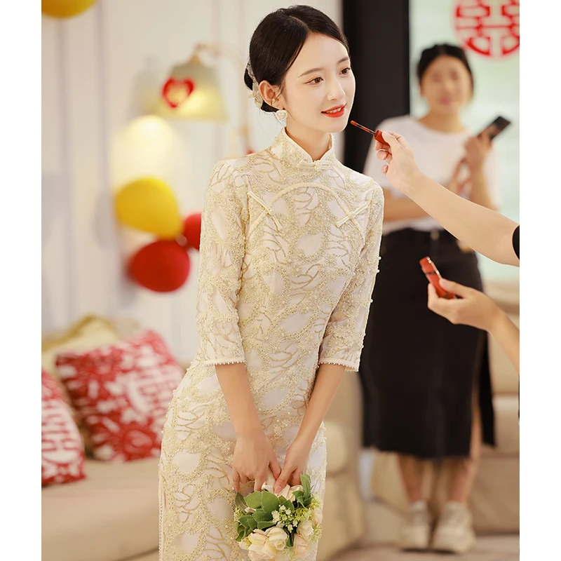 

Свадебное платье-ципао для молодой невесты, цвета шампань, с кружевом, винтажное, с круглым вырезом, рукавом 3/4, низким разрезом, для повседневной носки, эксклюзивно онлайн.