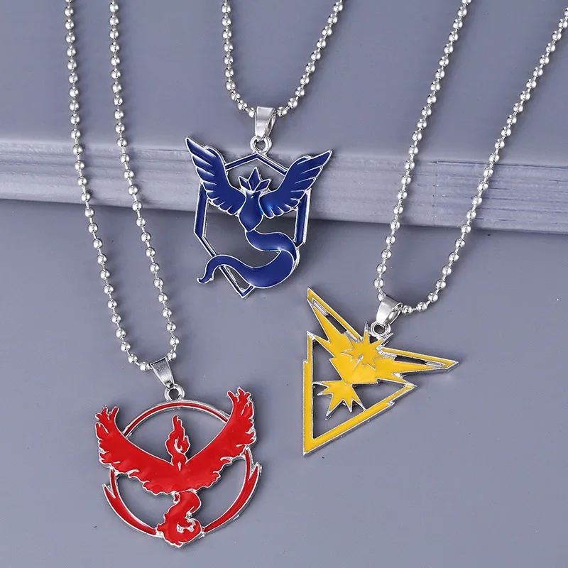 Pokemon Animation Game Articuno Zapdos Moltres Logo Plating Alloy Key Chain Bag Key Ring Pendant Accessories Birthday Gifts