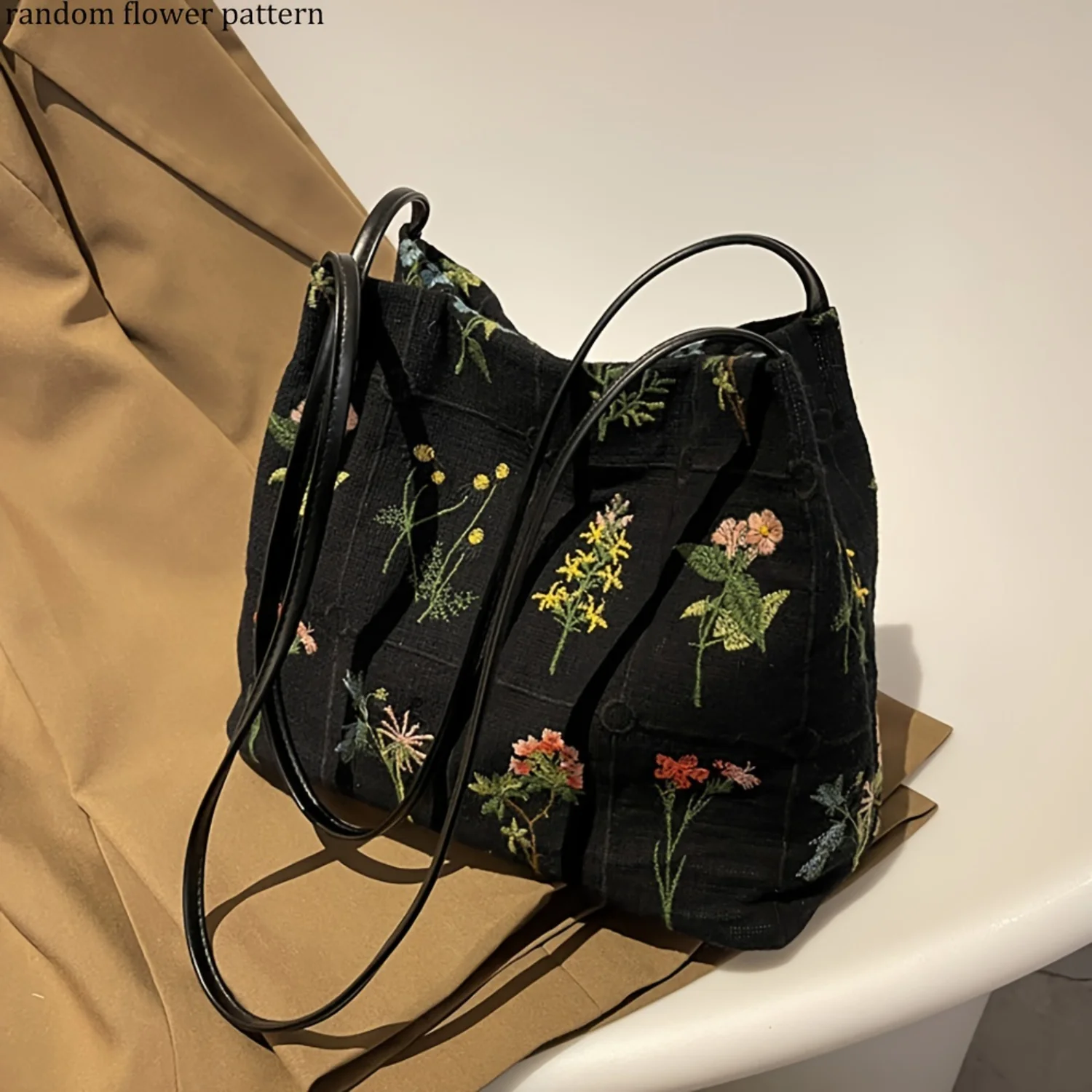 

Ethnic Floral Embroidered Sling Bag with Secure Closure and Versatile Straps – Stylish Daily Accessory