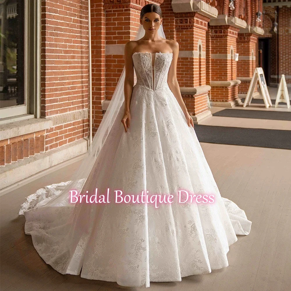 

Charming Wedding Dress Robe De Mariee Customized Strapless Sleeveless See Through Lace Applique Bridal Gown Sweep Train