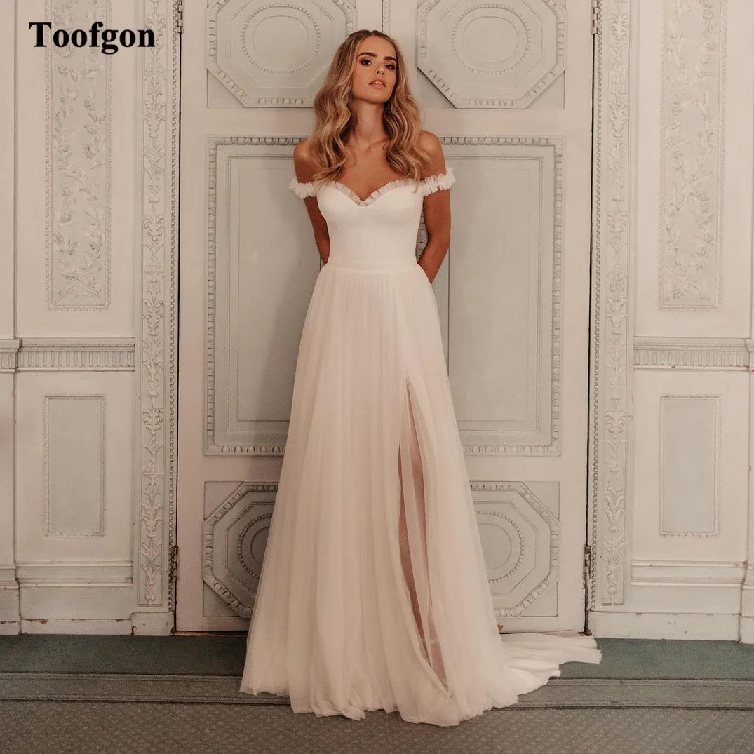 

Toofgon Simple Beach Wedding Party Gowns Off The Shoulder Pleated Split Side Bride Wedding Dresses Floor Length Bridal Gowns