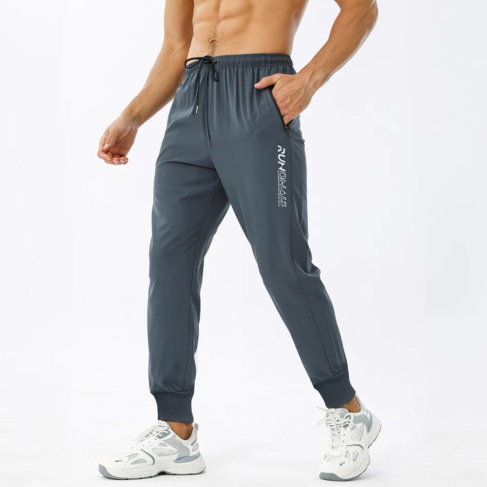 Pantalones de chándal con cremallera y bolsillo para hombre, ropa ajustada para entrenamiento de fútbol y trotar, a la moda, novedad