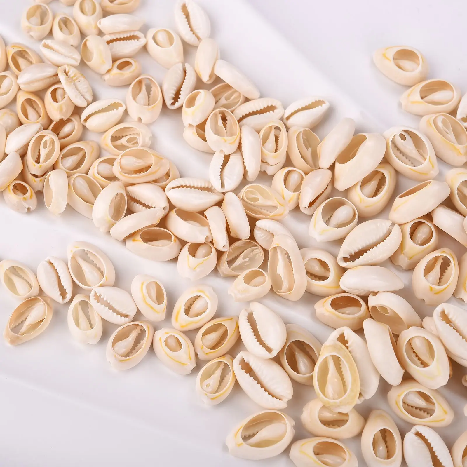 20/50 szt. Małe wycięte pasmo morskie naturalne muszle koraliki Cowry Cowrie ręcznie robiona biżuteria akcesoria do otworów DIY bransoletka dla kobiet