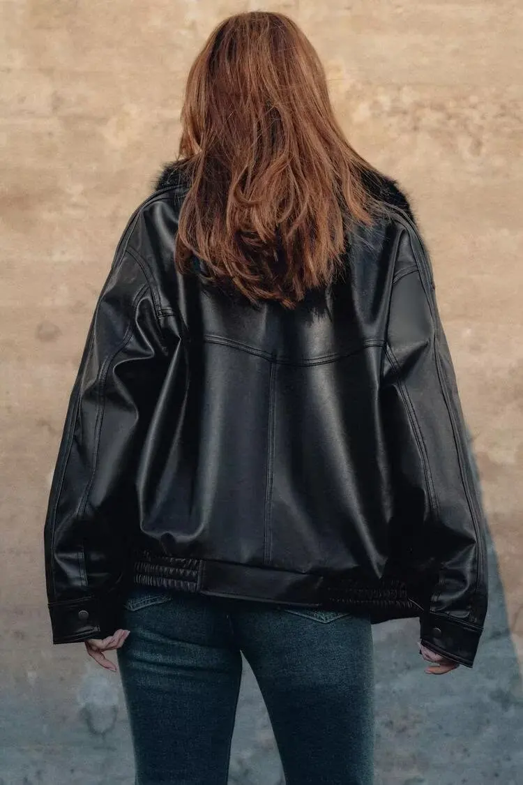 المرأة السوداء الفراء طوق بولي Leather سترة جلدية كامل الأكمام فضفاضة جيب سستة معطف قصير 2025 سيدة جديدة الخريف ملابس عالية الشارع