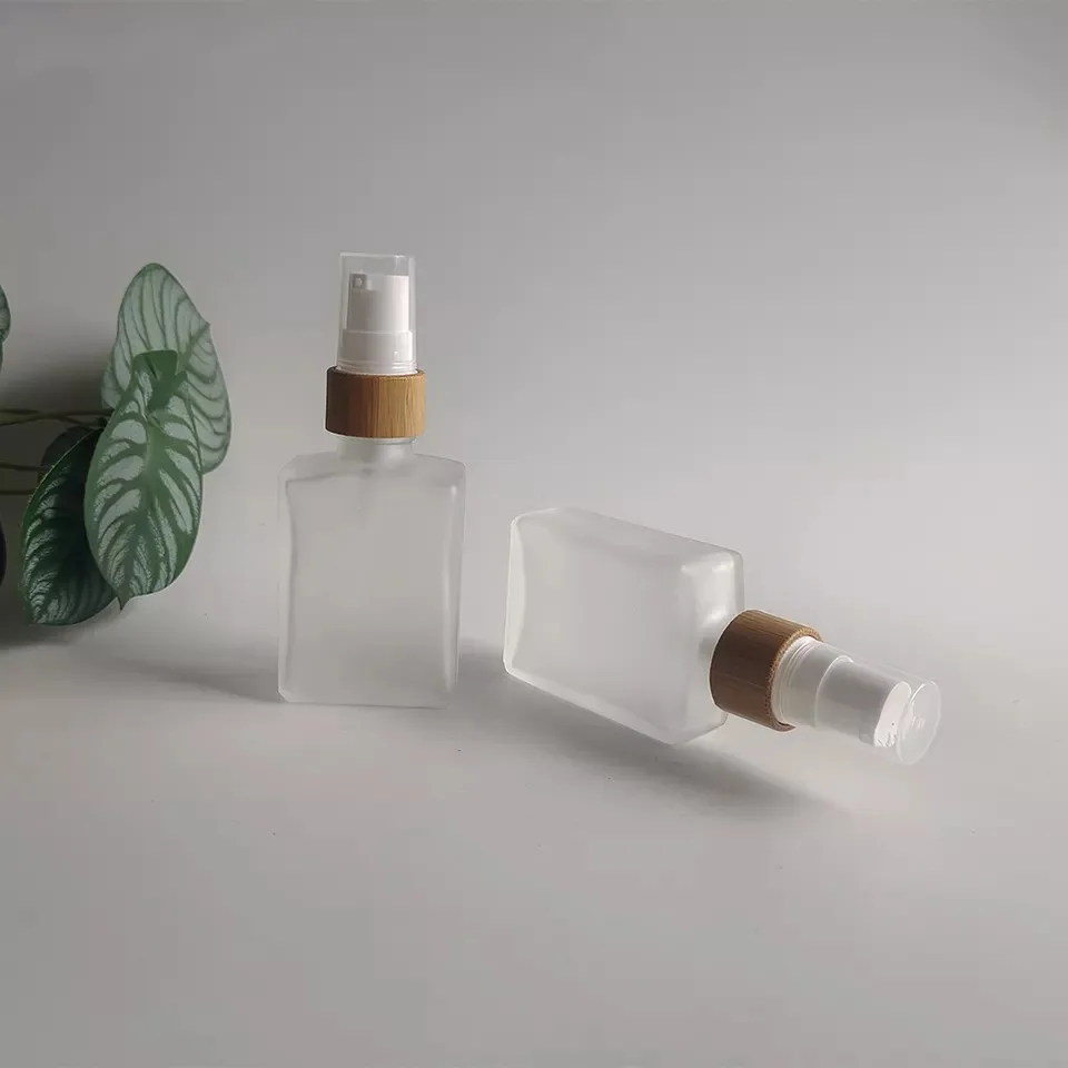 

Wholesale Refillable Cosmetic Container 30ml 1oz Frosted Glass Lotion Bottle with Bamboo Lid For Beauty Makeup SkincarePackaging