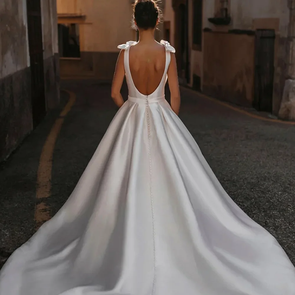 MANRUIXIN personnalisé une ligne robes De mariée Satin nœud papillon sans manches Robe De mariée col en v dos nu Robe De mariée robes De Noiva