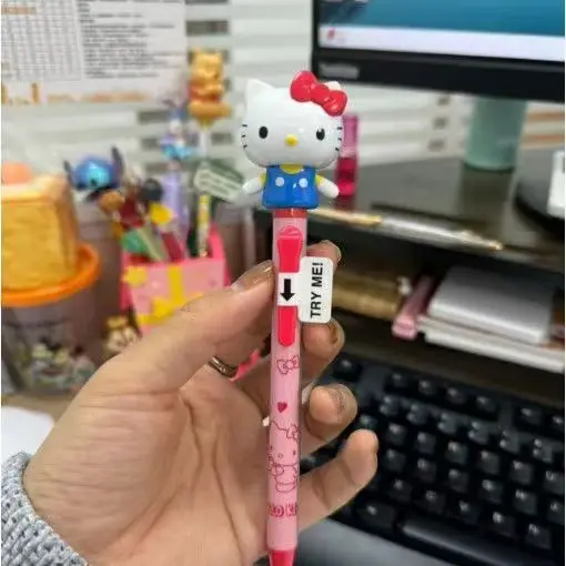 مرحبا كيتي KT القط ميلودي كورومي يوجوي الكلب دمية الذراع المحمول قلم حبر جاف قلم كارتون هدايا عيد الميلاد طلاب المدارس