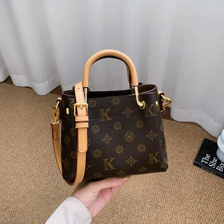 

2026 New Women's Unique Vintage Bucket Bag Luxury Convertible Top Handle Crossbody Shoulder Bag Elegant Designer-inspired Purse