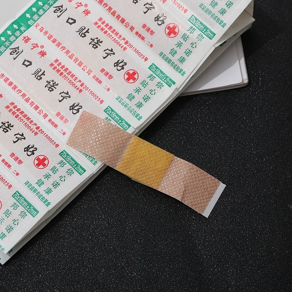 50 ชิ้น/แพ็ค First Aid Woundplast Breathable ผ้าพันแผลกาวทางการแพทย์บาดแผล Band Aid พลาสเตอร์