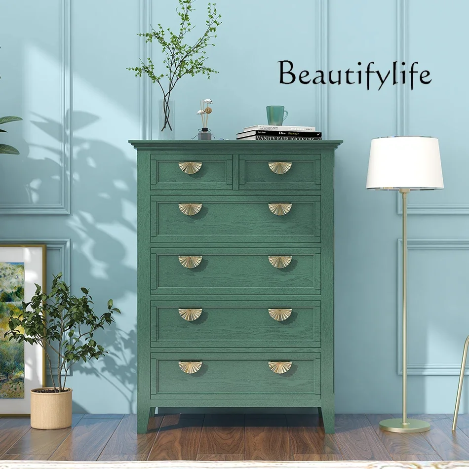 Dark green chest of drawers, simple modern bedroom against the wall, entrance, bedside storage cabinet, locker