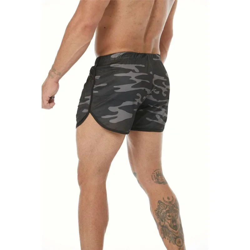 ยิมวิ่งกางเกงขาสั้นผู้ชายออกกําลังกายด่วนแห้งบางพอดีสบายๆชายหาดแสงกีฬากางเกงขาสั้นชาย