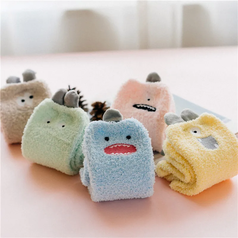 

Qisin Cute Little Monster Cartoon Fuzzy Socks Women Coral Velvet Medium Tube Funny Socks Cotton for Winter and Autumn Keep Warm