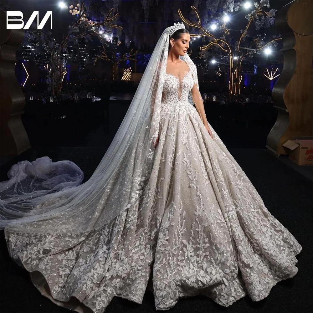 Abito da sposa con applicazioni di perline squisite con abito da ballo pesante con maniche lunghe a illusione per la sposa Robe De Mariee su misura