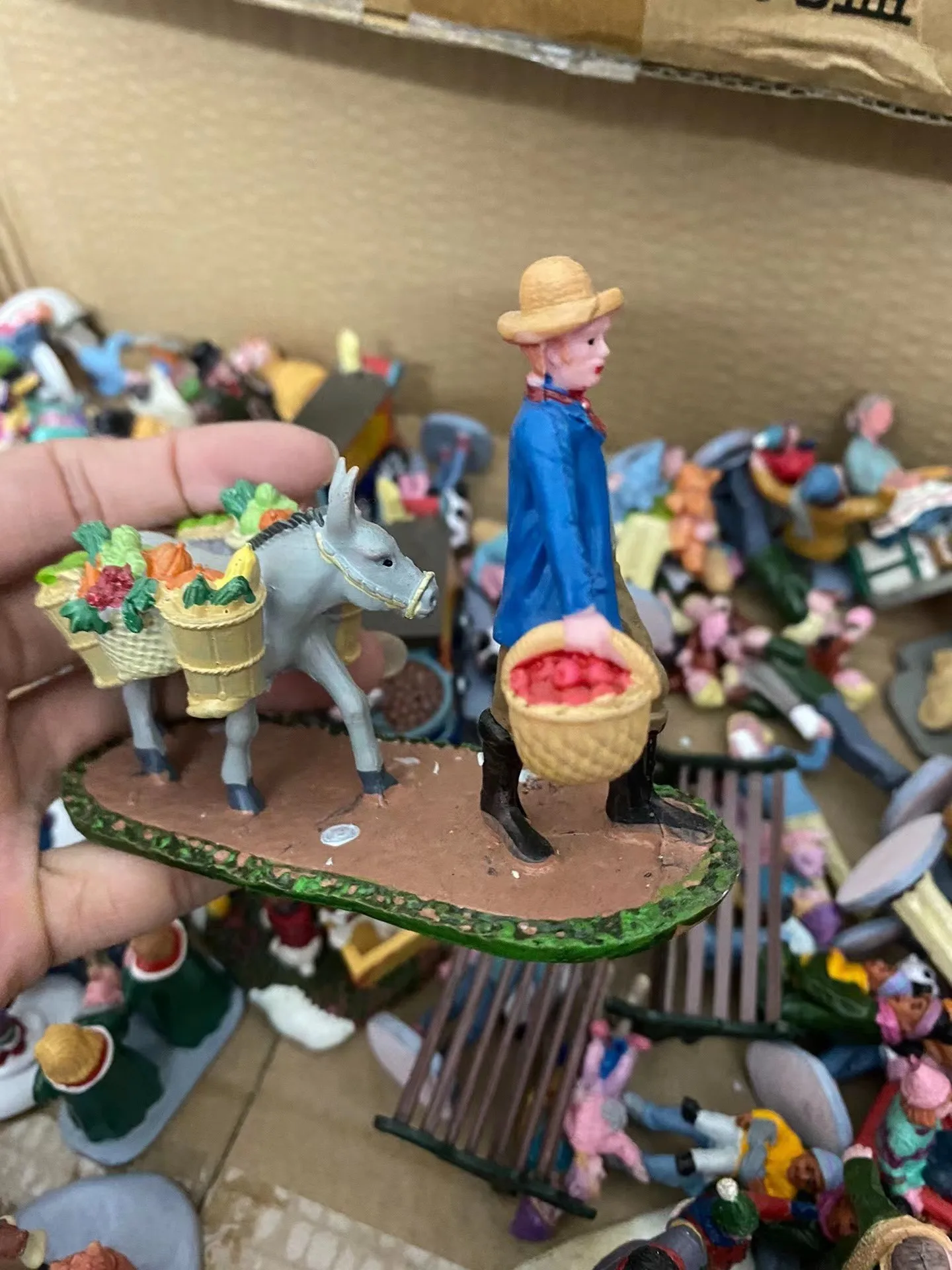 

Resin figure mental psychological sand table game box court therapy a woman leading a donkey
