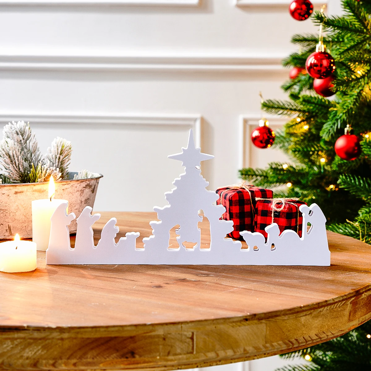 A creative and simple white Nativity silhouette decorative item, a white snowflake board Christmas home desktop decorative item