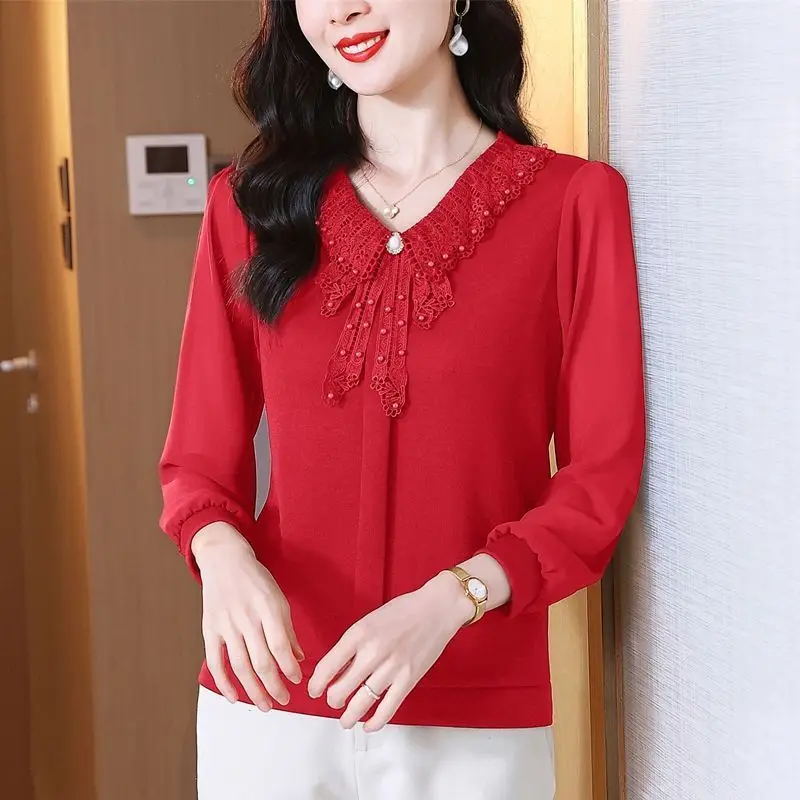 

2024 New Spring and Autumn Korean Edition Elegant and Fashionable Pullover Doll Neck Embroided Flares Long Sleeved Women's Top