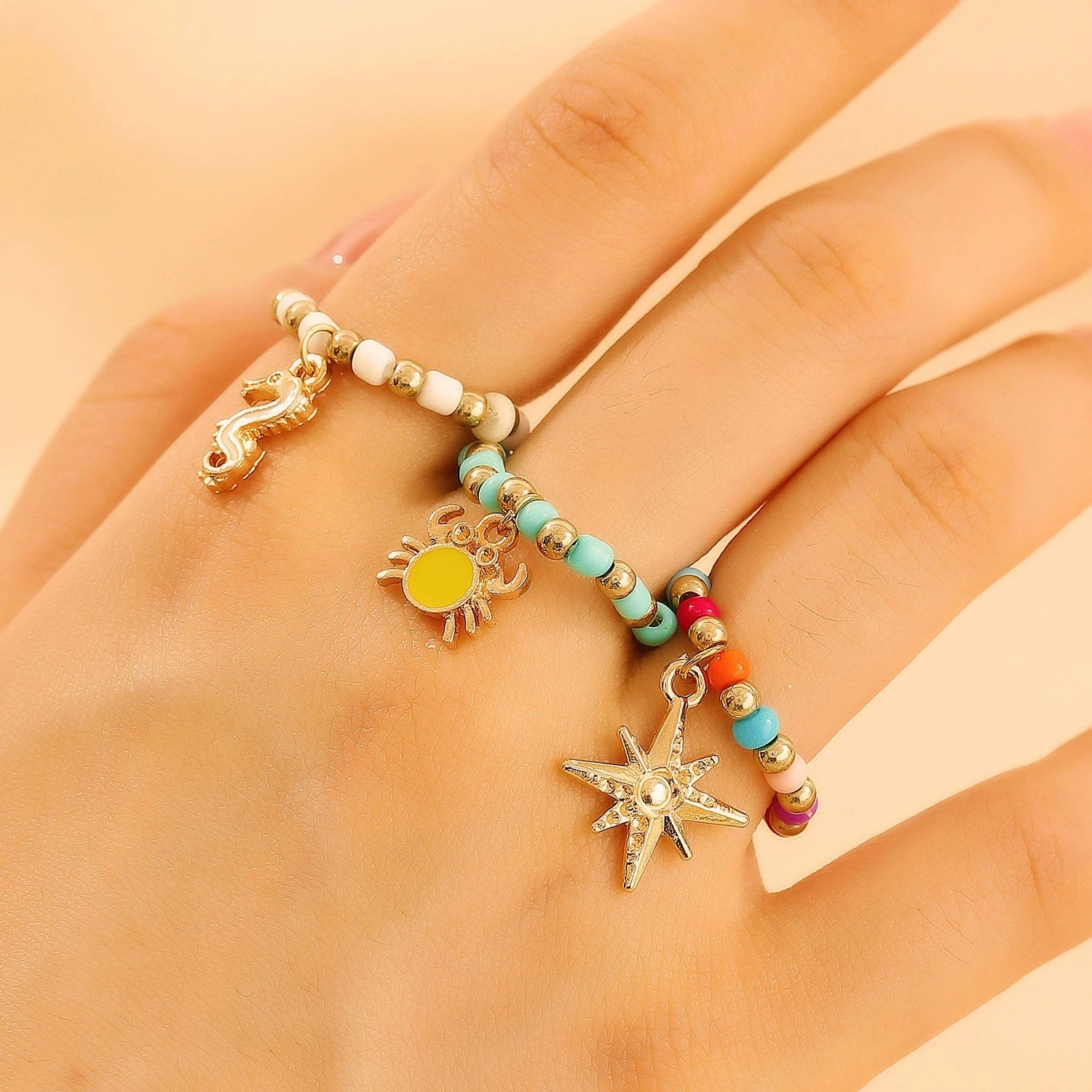 Anillo bohemio de moda con cuentas de arroz de jade de caballito de mar y cangrejo de estrella hecho a mano de colores Vintage