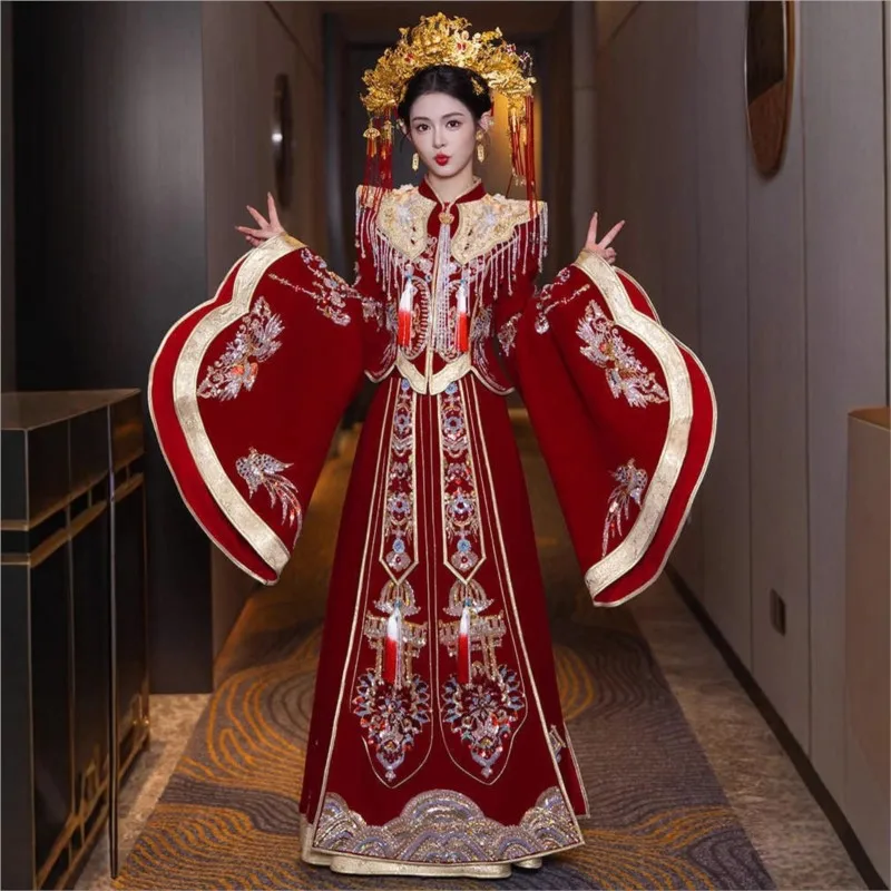 

A traditional Chinese wedding dress with phoenix crown and red cape
