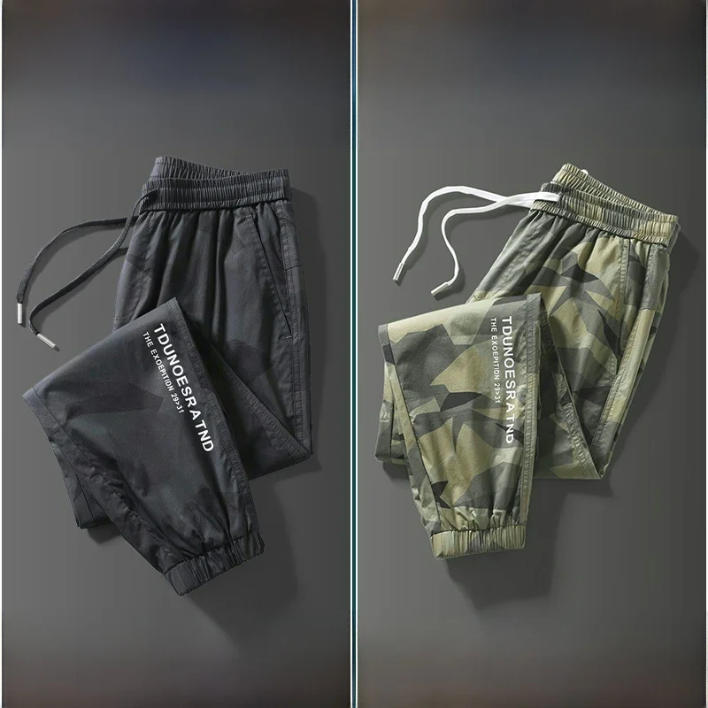 กางเกงคาร์โก้ผู้ชายทรงฮาร์แลน ผ้าไหมน้ำแข็ง ใส่สบาย ทนทานต่อการสึกหรอ ทำความสะอาดง่าย เหมาะกับฤดูใบไม้ร่วง ทรงหลวม ทันสมัย สไตล์วัยรุ่น สีดำ