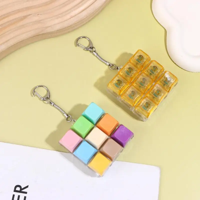 Bestseller 9-Tasten Finger-Tastaturkappen Stressabbau-Spielzeug Knopf-Tastenkappe Schlüsselanhänger Mechanische Tastatur-Taste Stressabbau-Spielzeuge