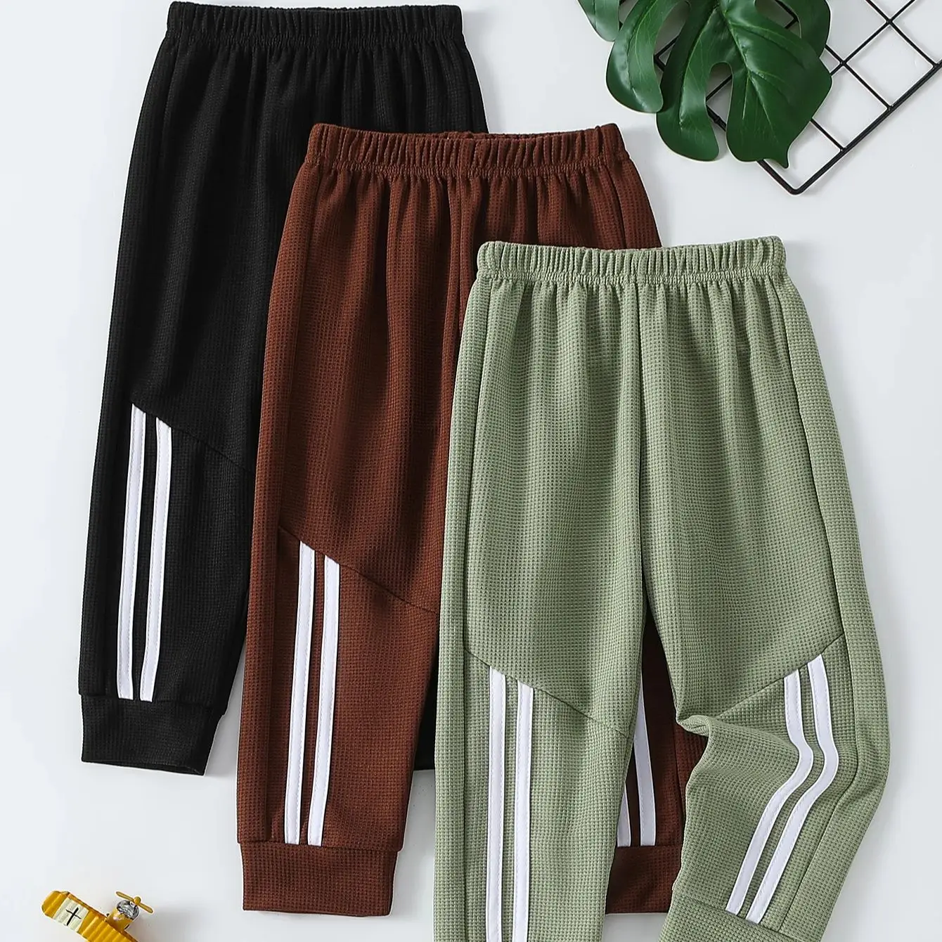 1/3 pezzi pantaloni sportivi in tinta unita waffle per bambini ragazzi pantaloni casual Joker Harun pantaloni da corsa in vita elastica pantaloni moda per ragazze