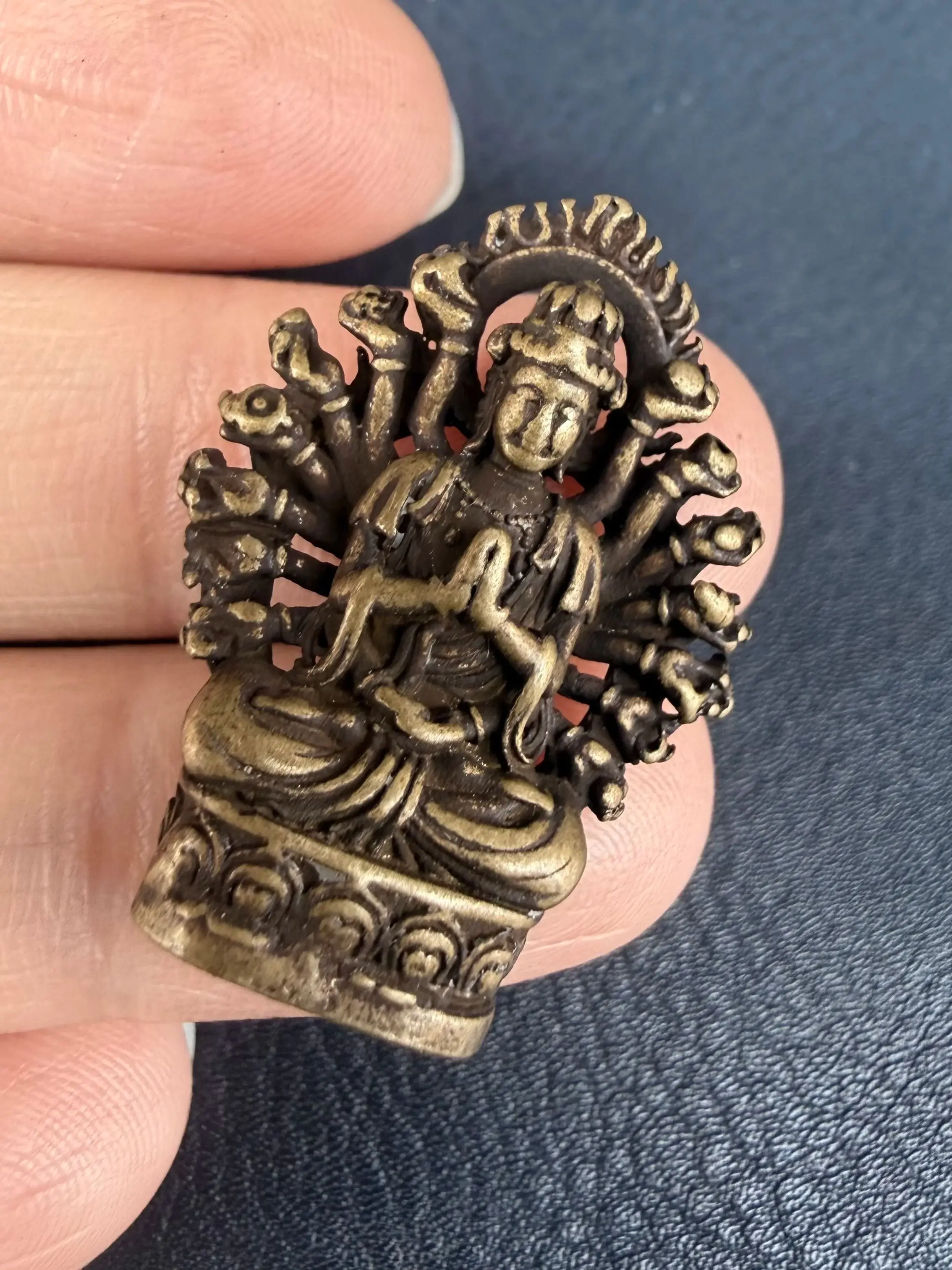 Retro micro carved yellow Lima copper mini thousand handed Guanyin ornament
