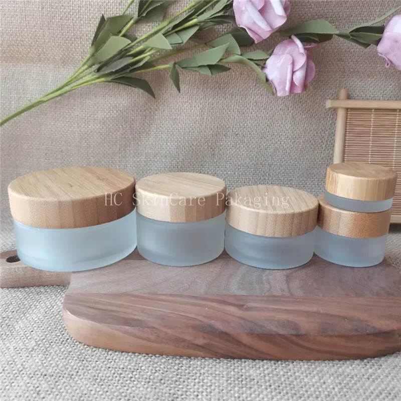 

hot sale Cosmetic Glass Jar wooden box bamboo cosmetic cream jar for cream Empty frosted glass cream container packaging bottle